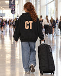 Lifestyle photo of the CT Monogram Puff Hoodie in Black