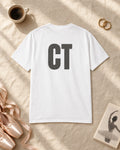Flat lay of the CT Monogram Puff Tee in White