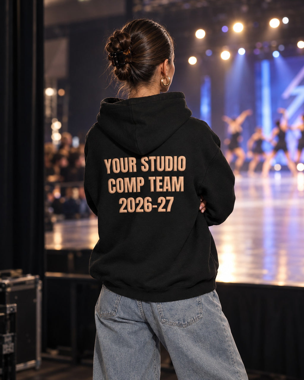 Lifestyle photo of the Comp Team 2026-27 Personalized Puff Hoodie in Black