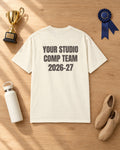 Flat lay of the Comp Team 2026-27 Personalized Puff Tee in Ivory