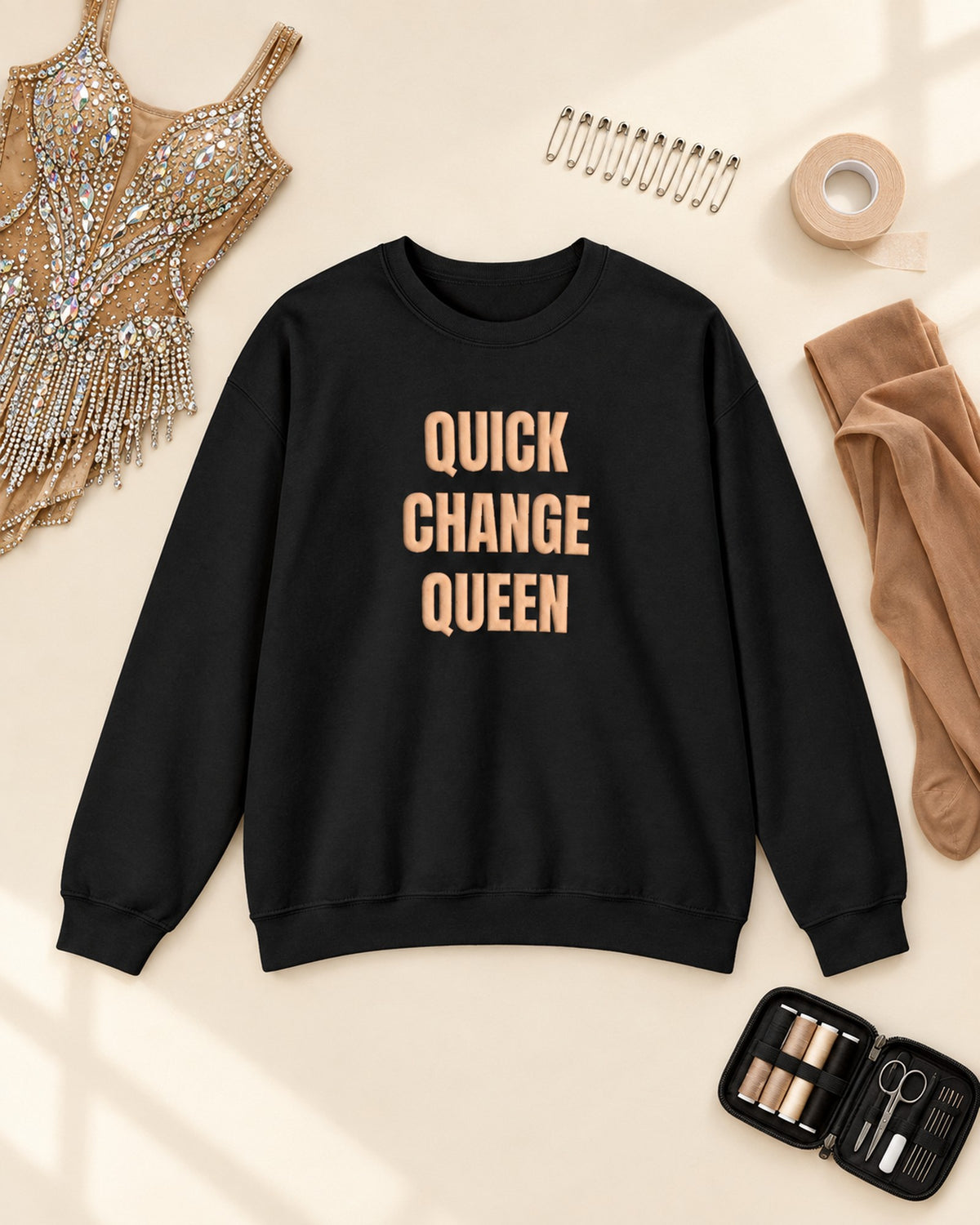 Flat lay of the Quick Change Queen Puff Crewneck in Black
