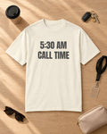 Flat lay of the 5:30 AM Call Time Puff Tee in Ivory