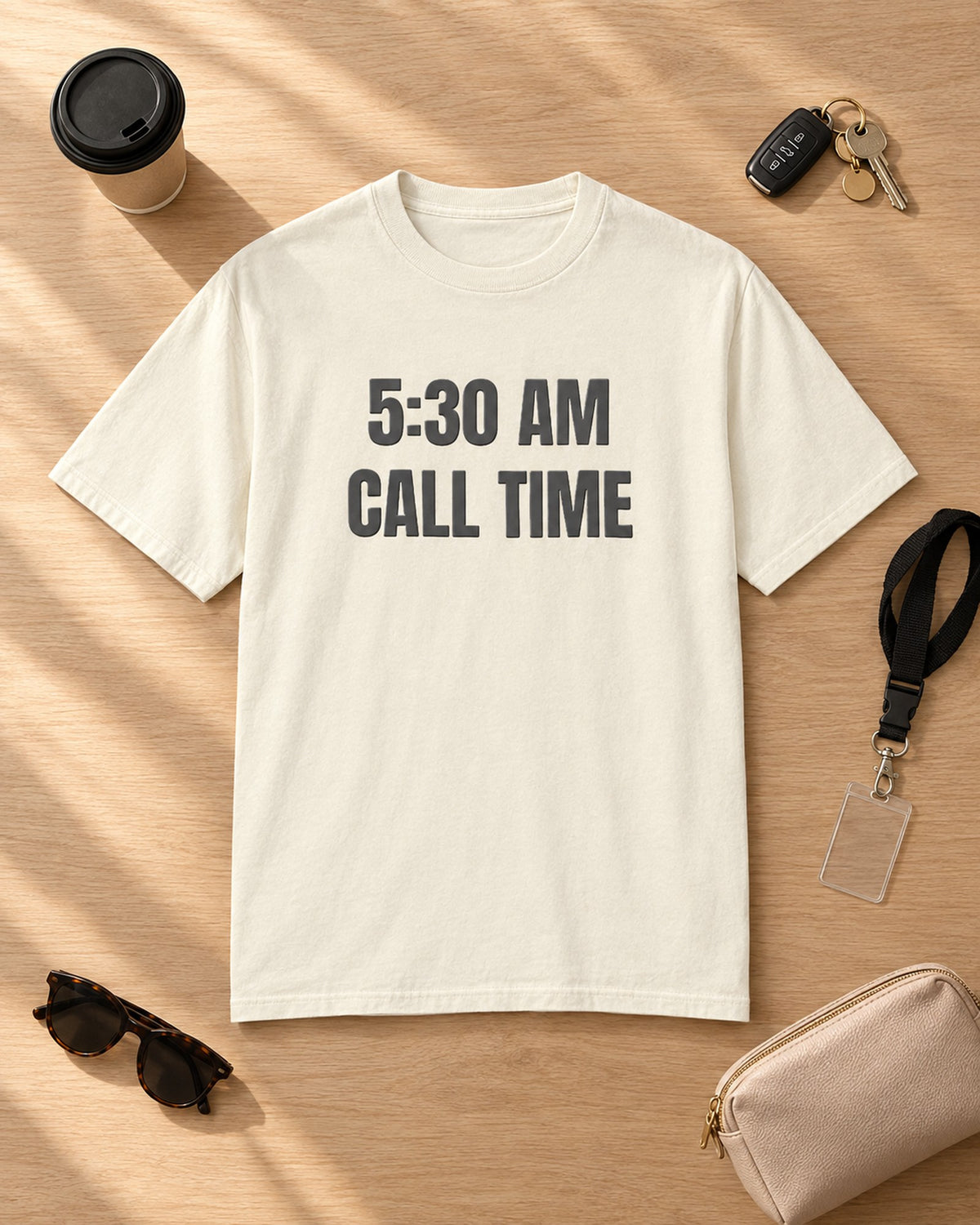 Flat lay of the 5:30 AM Call Time Puff Tee in Ivory