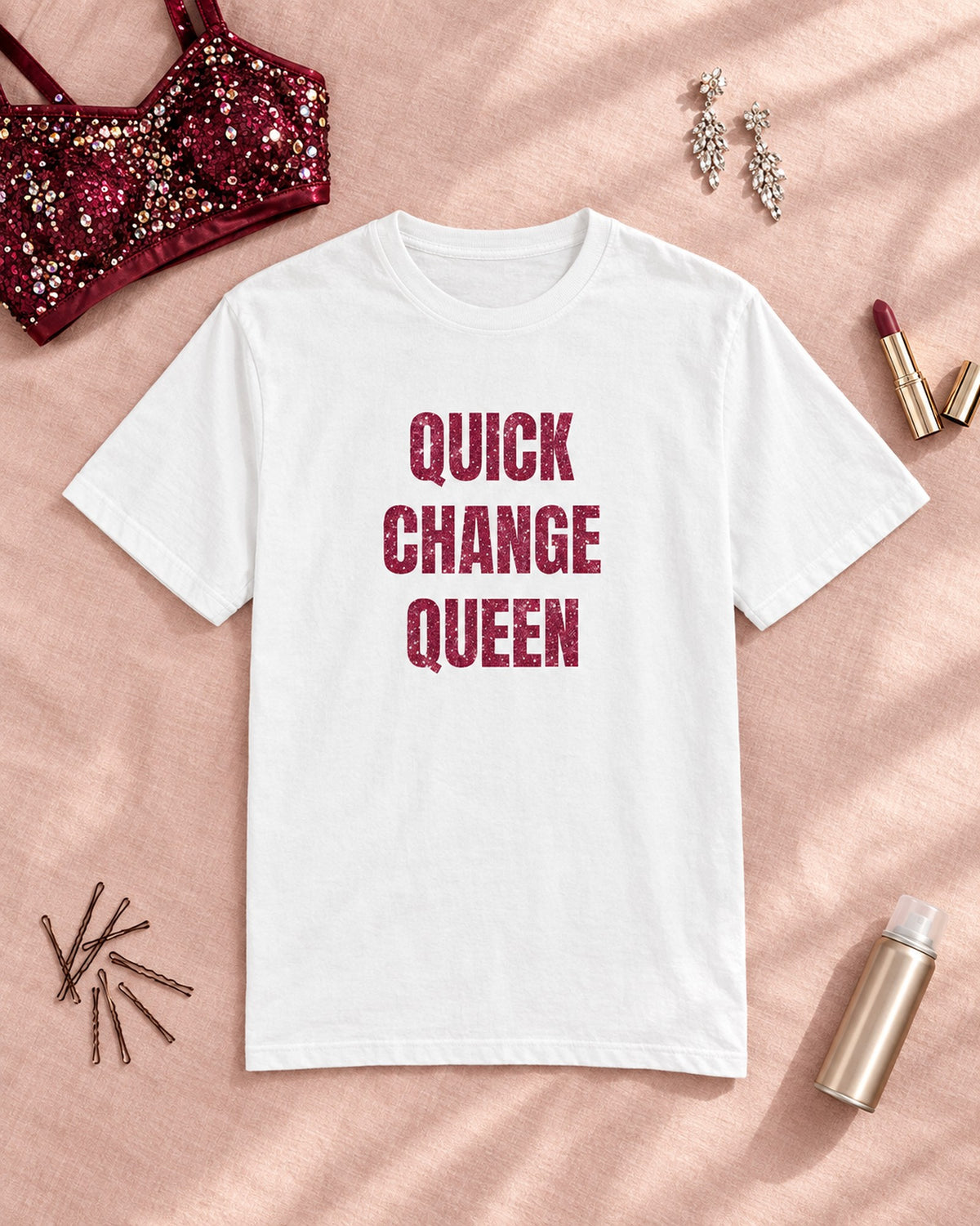 Flat lay of the Quick Change Queen Glitter Tee in White